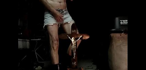  666 BLASPHEMIC PISS ALL OVER FUCKING CRUCIFIX IN SEXY USED JEANSSHORT, BLACK SPANDEX STRING AND BOOTS. SMOKING